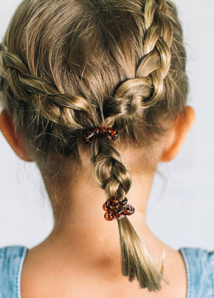 Model Wearing Teleties Spiral Hair Coils | Tiny | Tortoise Hair Ties