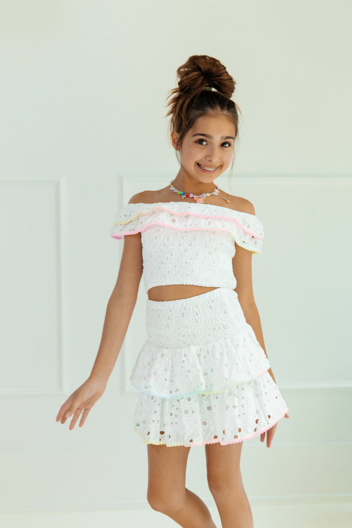 Model Wearing Lola And The Boys Rainbow Fancy Eyelet Set