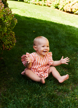 Model Wearing Pink Chicken Baby Girls Abigail 2-Piece Set - Orange Pink Stripe