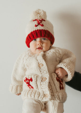 Model Wearing Huggalugs Candy Cane Cardigan Sweater & Beanie