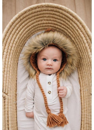 Model Wearing Huggalugs Fur Bonnet In Pecan
