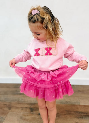 Model Wearing Sweet Winks XOXO Patch Sweatshirt and Heart Petal Tutu