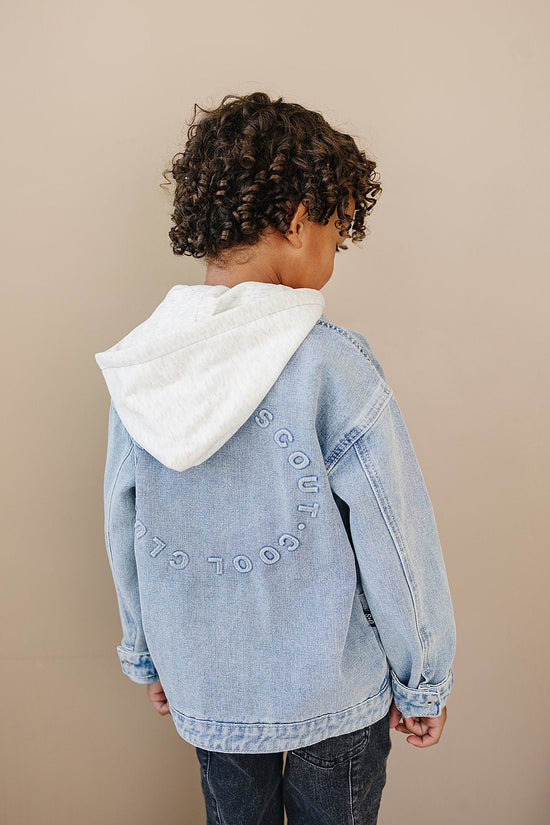 Model Wearing Olive + Scout Briggs Denim Jacket