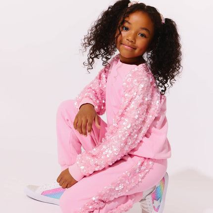 Model Wearing Lola And The Boys Pink Sequin Joggers Set