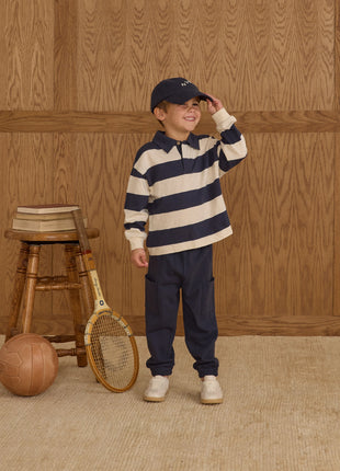 Model Wearing Rylee & Cru Rugby Polo || Navy Stripe