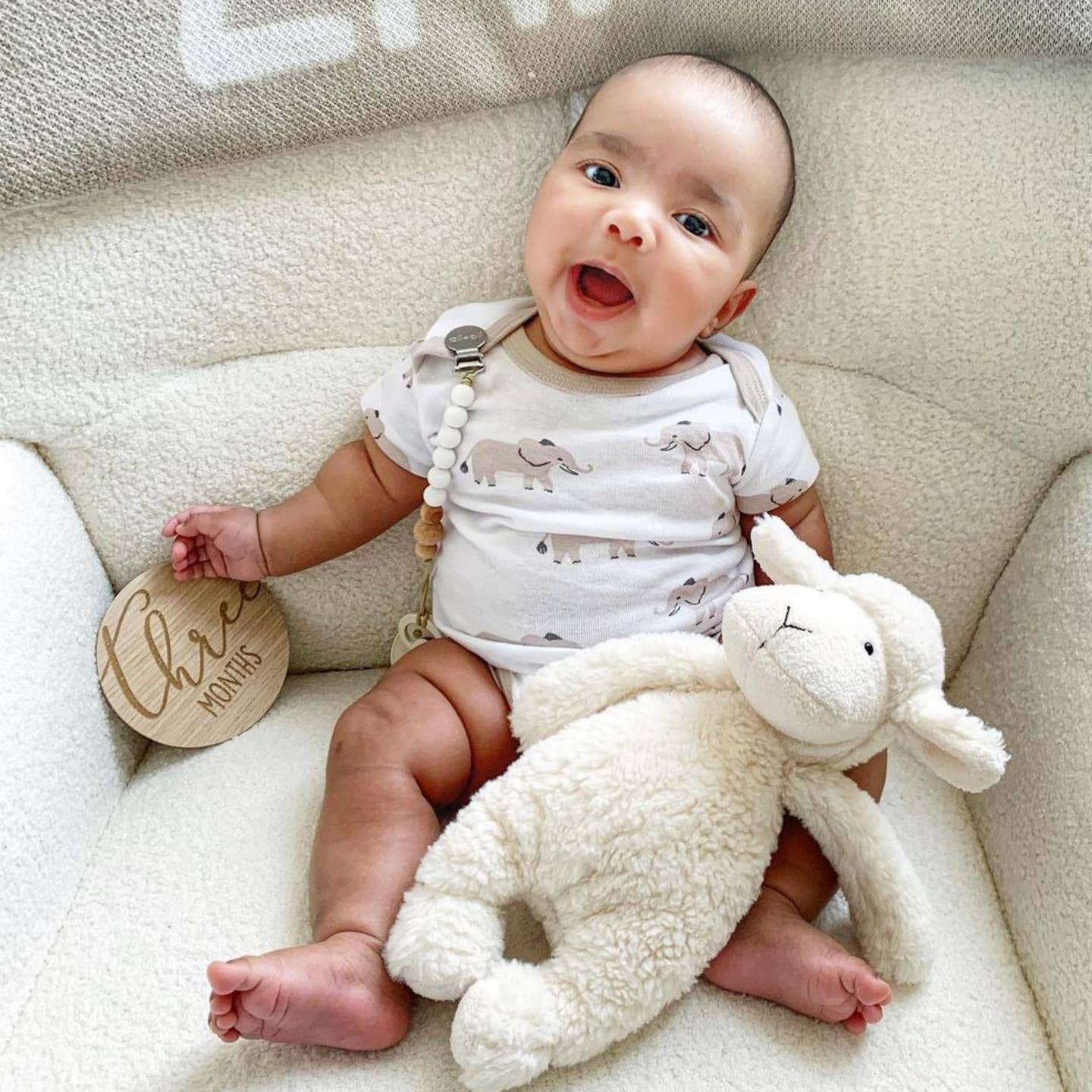 Model Using Ali+Oli Silicone Pacifier Clip (White Wood)