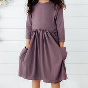 Model Wearing Mila & Rose Vintage Violet 3/4 Sleeve Pocket Twirl Dress