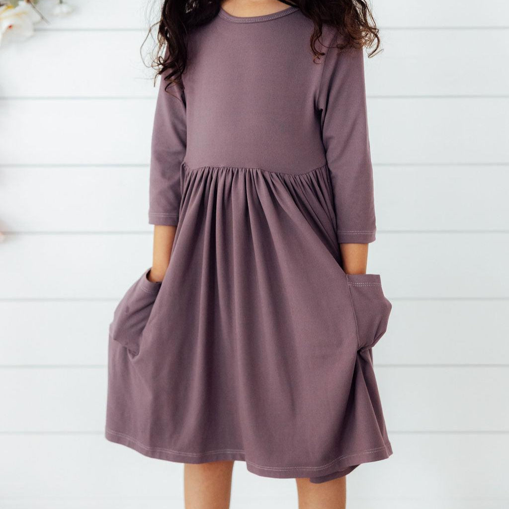 Model Wearing Mila & Rose Vintage Violet 3/4 Sleeve Pocket Twirl Dress