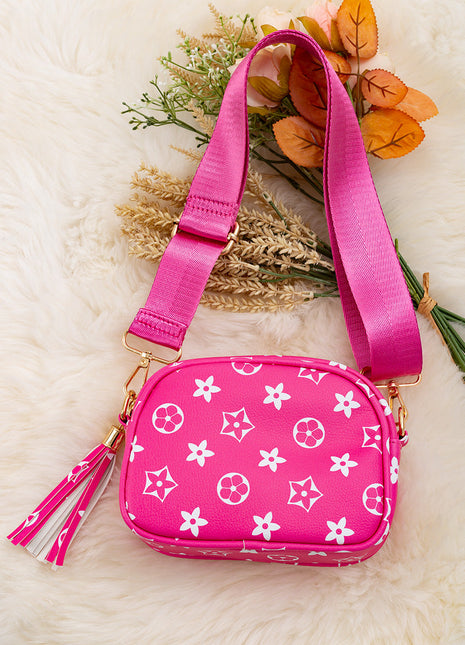 Kids Charm Online Fuchsia star printed mini purse with wide strap. BBG40038 M
FUCHSIA