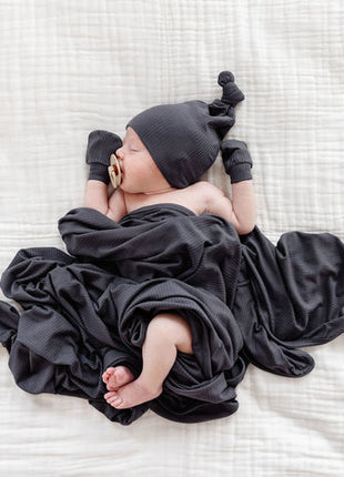 Model Wearing Lou Lou & Company Hudson Ribbed Top Knot Hat