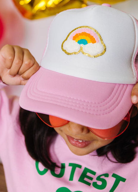 Model Wearing Sparkle Sisters Rainbow Patch Trucker Hat