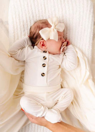 Model Wearing Lou Lou & Company Satin Bow - Cream Headband