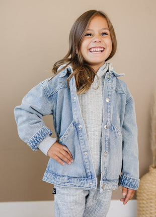 Model Wearing Olive + Scout Briggs Denim Jacket