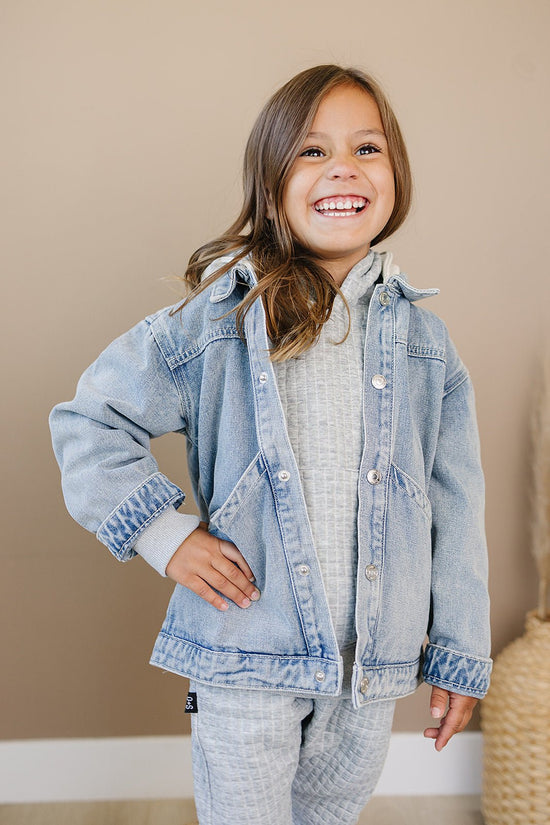 Model Wearing Olive + Scout Briggs Denim Jacket