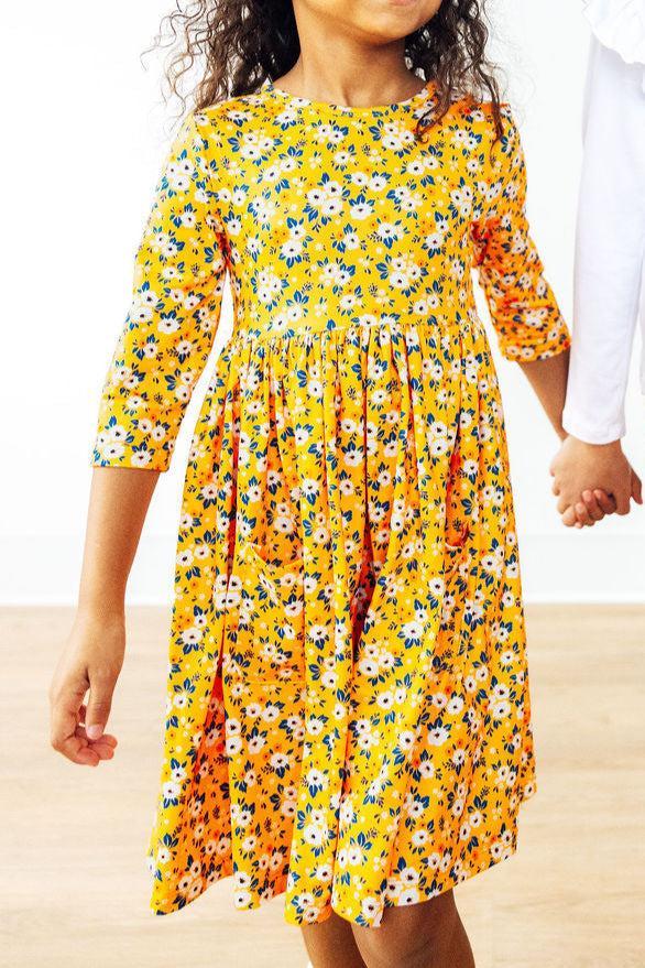 Model Wearing Mila & Rose Fall Floral 3/4 Sleeve Pocket Twirl Dress