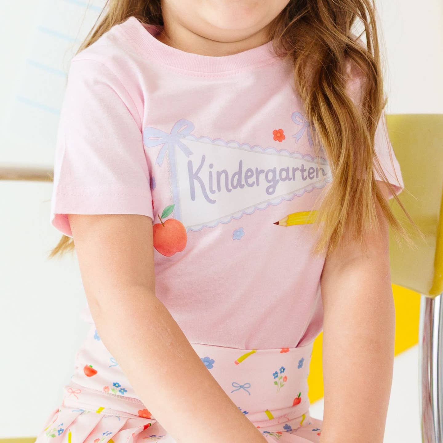 Model Wearing Sweet Wink Kindergarten Pennant Short Sleeve T-Shirt - Back To School