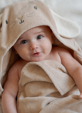 Model Wearing Elegant Baby Taupe Bunny Hooded Baby Bath Wrap