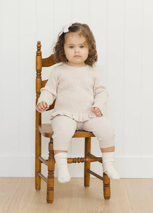 Model Wearing Quincy Mae Rib Knit Peplum Top || Heathered Oatmeal